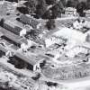 <p>Aerial view of the Integrated Fire Control Area for Nike missile Battery NY-15 at Fort Slocum (adjacent to center and lower right mortar pits), looking north, late 1950s.</p>
